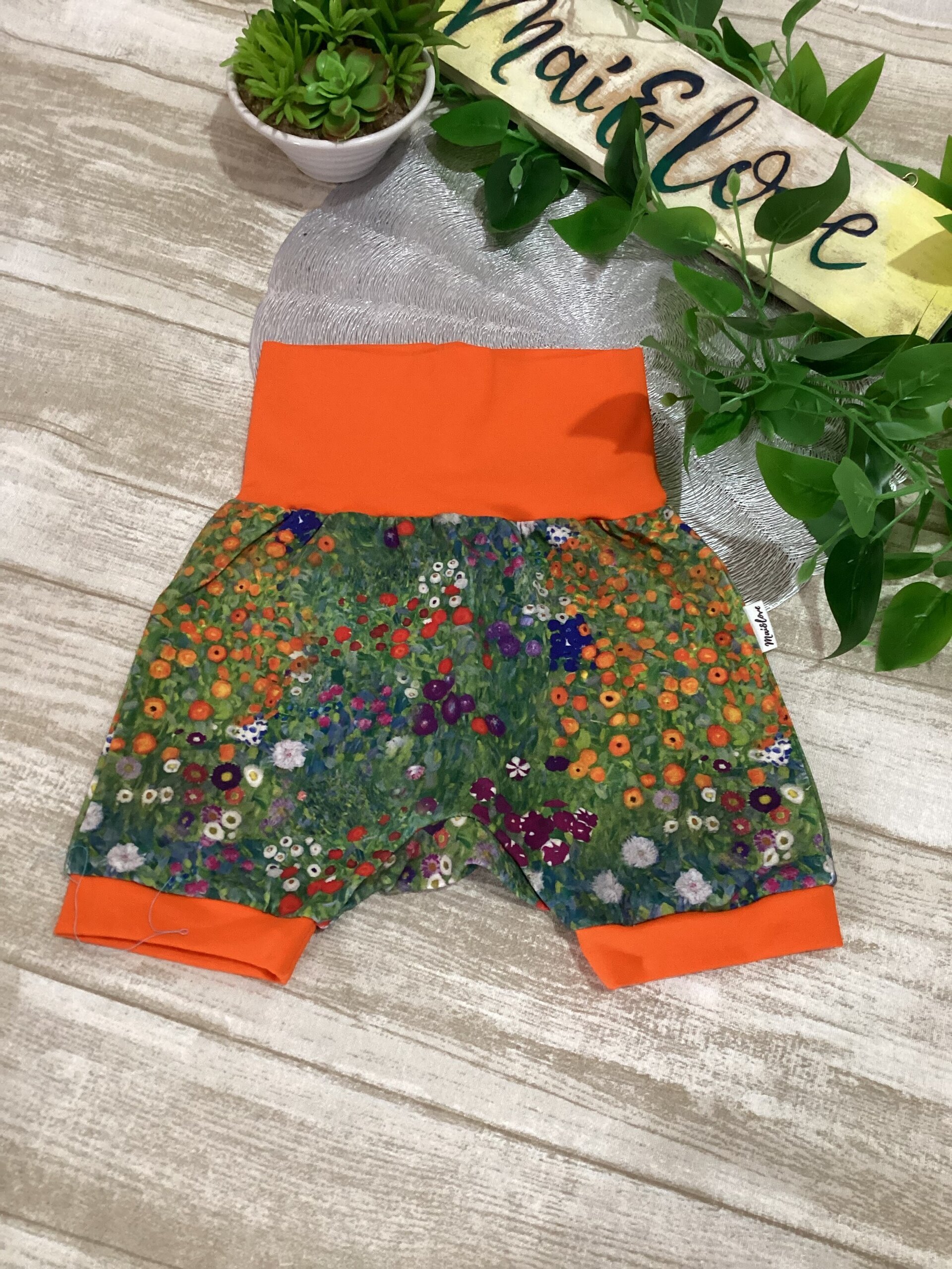 Pantalón corto 1/3 años. Flores cuadro. Punto. - 3
